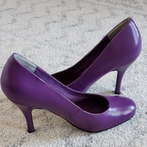 Purple round toe pumps